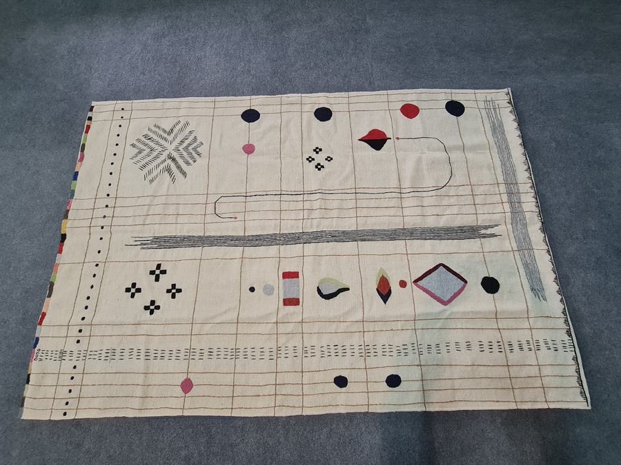 Custom hand-embroidered flatweave rug in hooked embroidered kilim, woven to order by Rug Gossips in Lahore