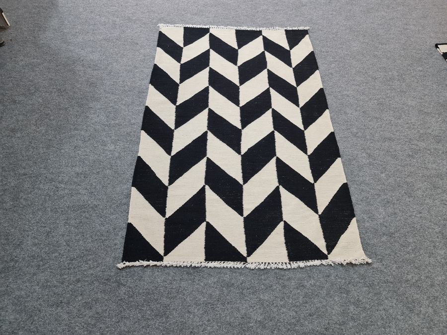 Custom flatweave kilim rug in black and white custom, woven to order by Rug Gossips in Lahore