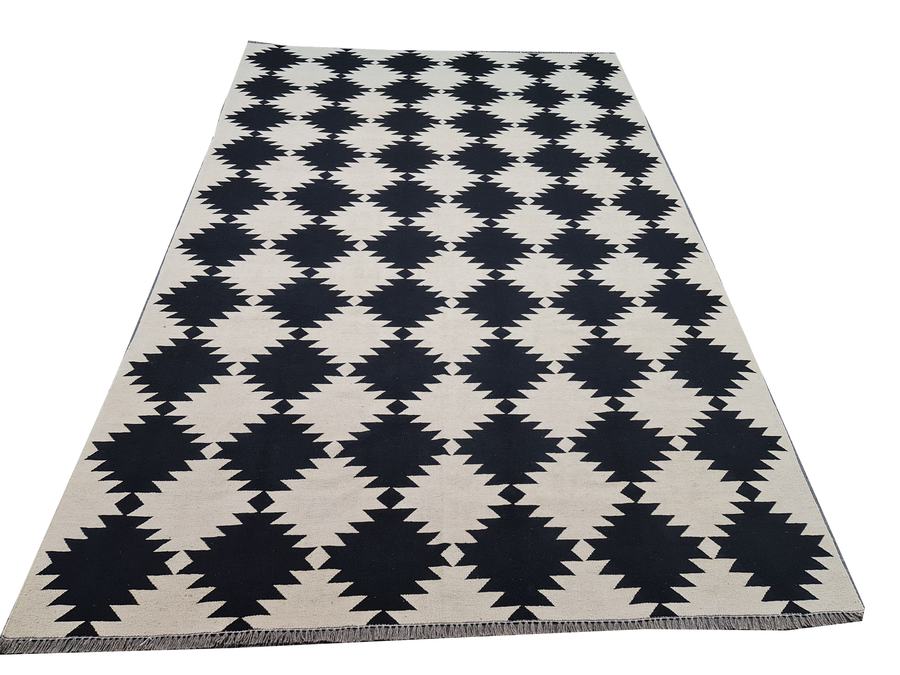 Custom flatweave kilim rug in black and white designer, woven to order by Rug Gossips in Lahore