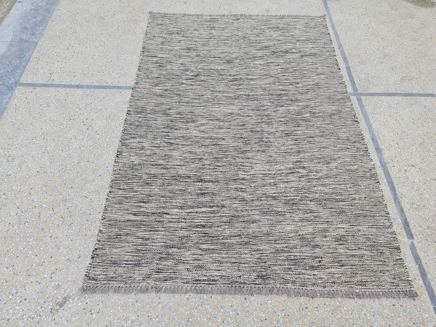 Custom flatweave kilim rug in black and white, woven to order by Rug Gossips in Lahore