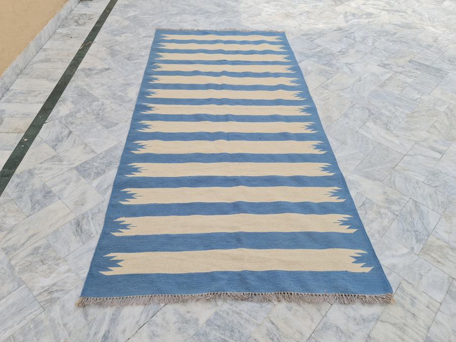Custom flatweave kilim rug in blue striped, woven to order by Rug Gossips in Lahore