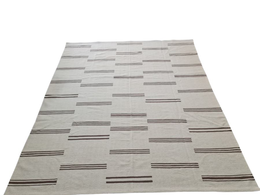 Custom flatweave kilim rug in brown and ivory, woven to order by Rug Gossips in Lahore