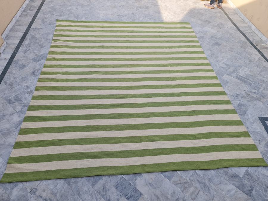 Custom flatweave kilim rug in green and white striped, woven to order by Rug Gossips in Lahore