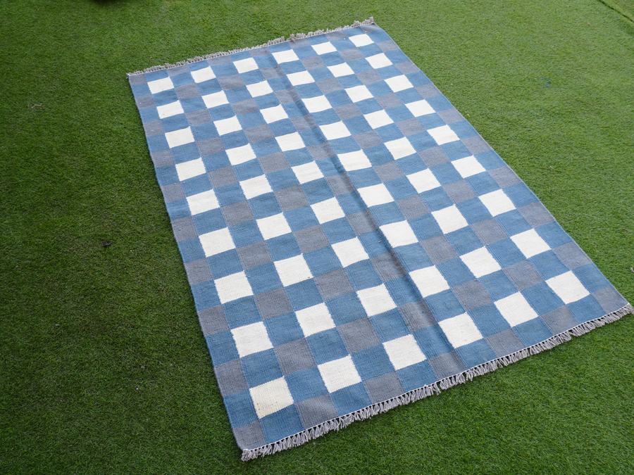 Custom flatweave kilim rug in grey blue white checkered, woven to order by Rug Gossips in Lahore