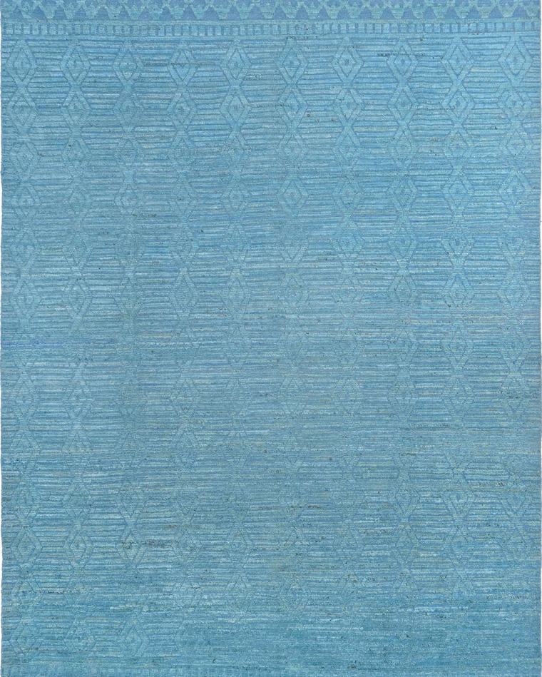 Custom hand-knotted wool rug in sky blue, 493 × 308 cm, woven to order by Rug Gossips in Lahore