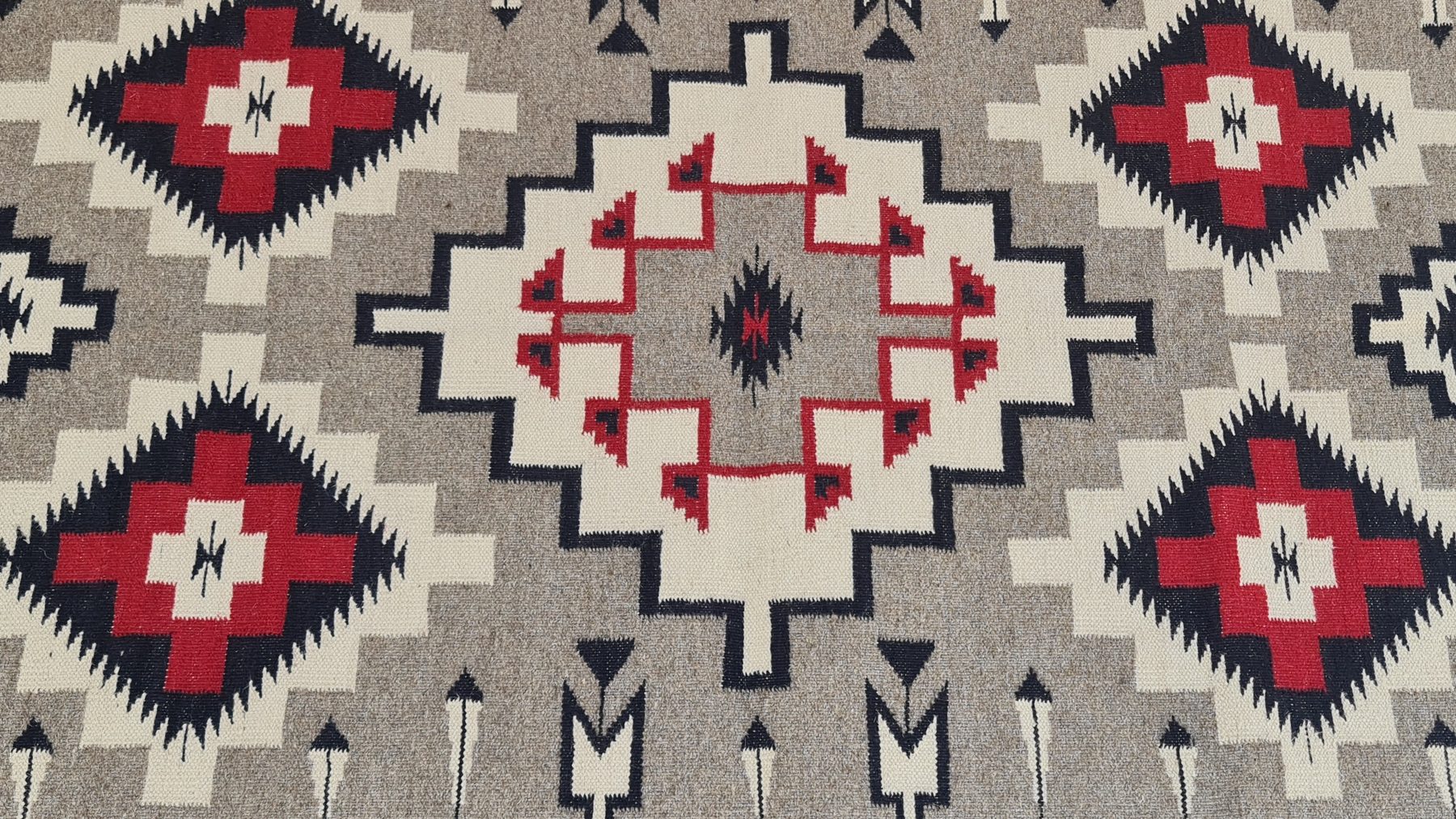 Detail of a custom southwestern rug woven by Rug Gossips in Lahore